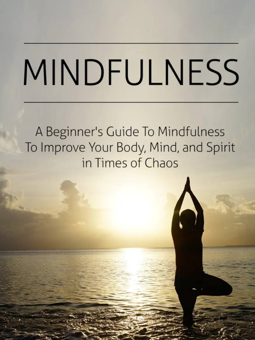 Cover of a book titled "Mindfulness: A Beginner's Guide to Mindfulness to Improve Your Body, Mind, and Spirit in Times of Chaos." It features a silhouette of a person performing a yoga pose by the sea during sunset.