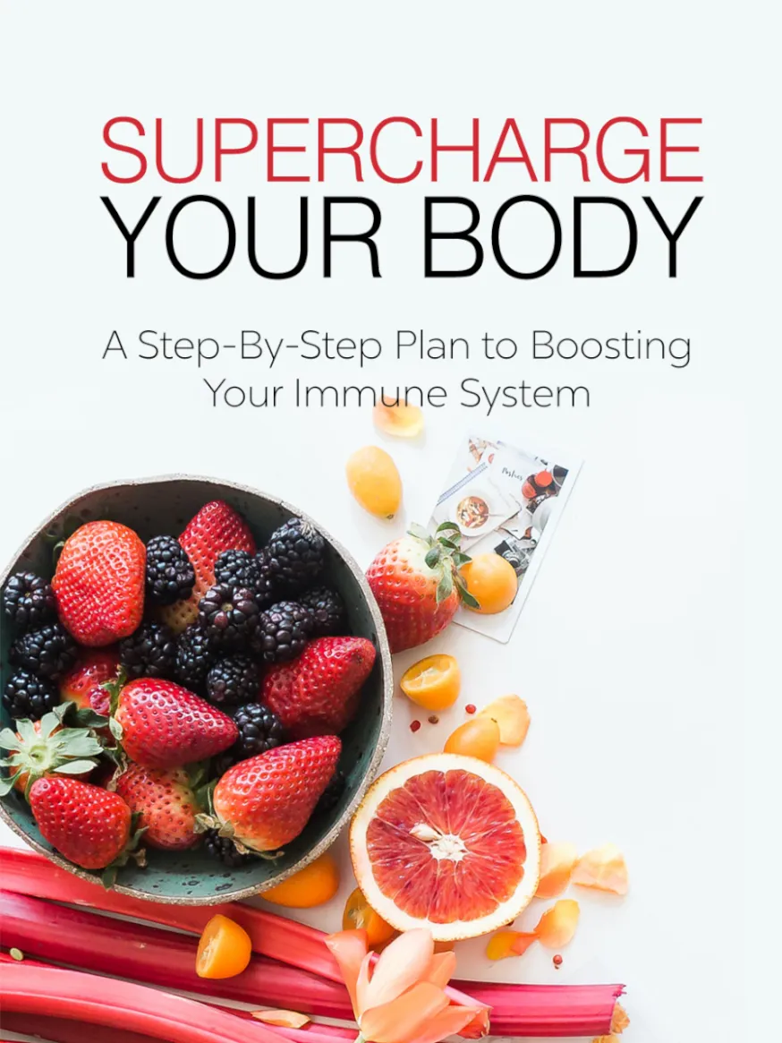 Cover of a book titled "Supercharge Your Body: A Step-By-Step Plan to Boosting Your Immune System." It features a bowl of berries, sliced grapefruit, and rhubarb, against a white background.